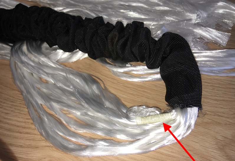 An image of the tape holding a synthetic round sling together