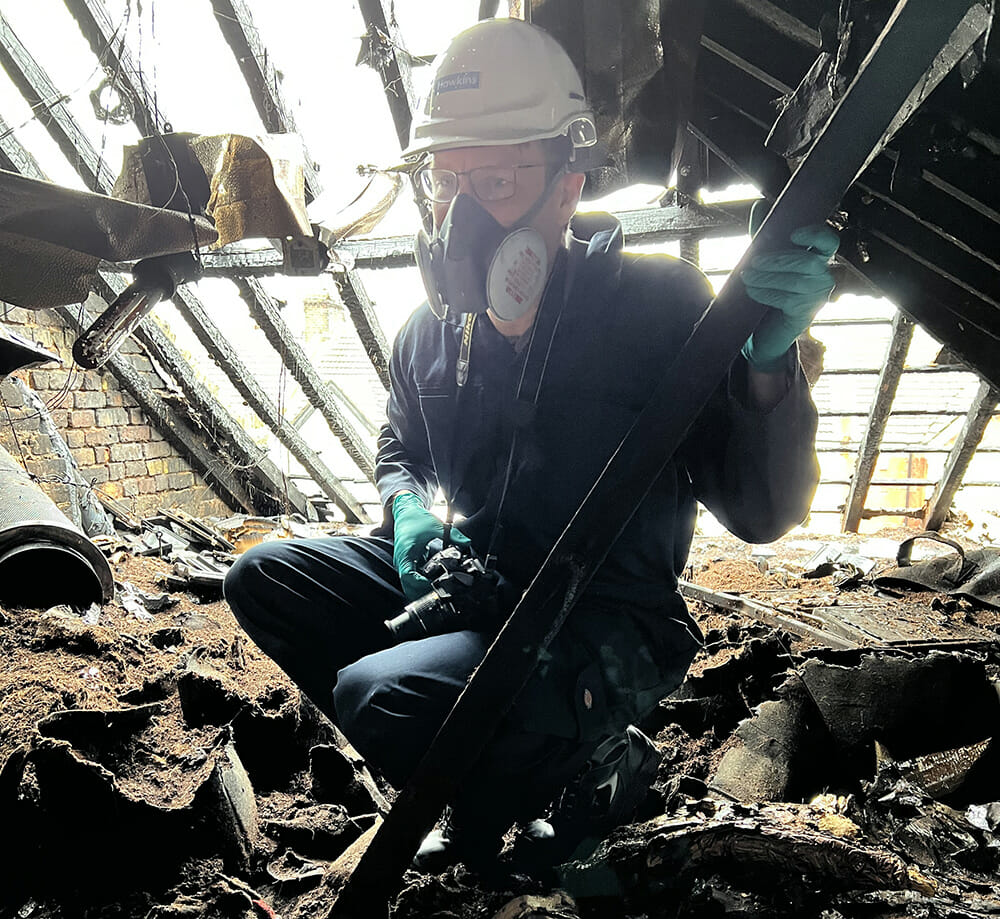 Forensic investigator James Townsend at a scene investigating a house fire