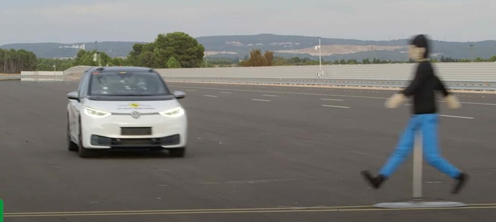 Testing the breaking system with a cardboard cut-out pedestrian simulating someone walking out in front of a car