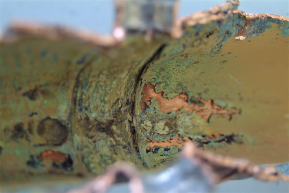 Close up of eroded pipework