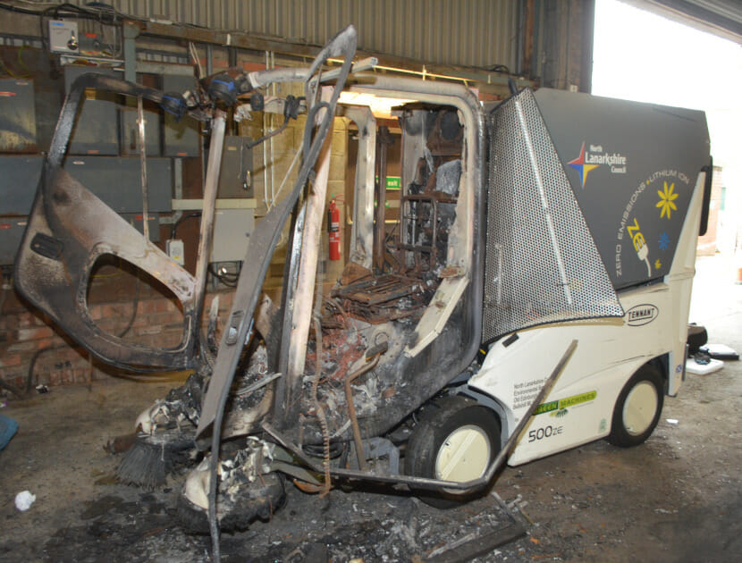 A burnt out road sweeper