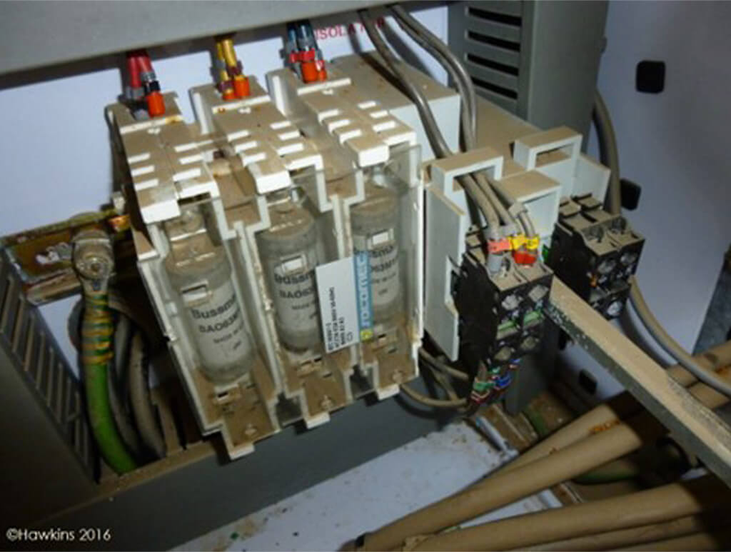 Corrosion of distribution board components due to water ingress.