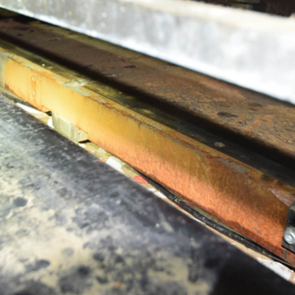 Surface corrosion due to combustion products