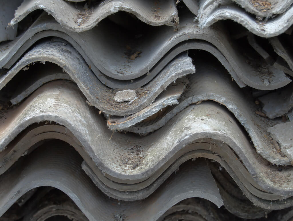 Asbestos cement roof boards.