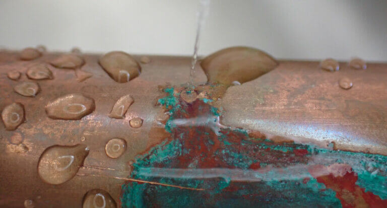 Copper pipe with pin hole water leak
