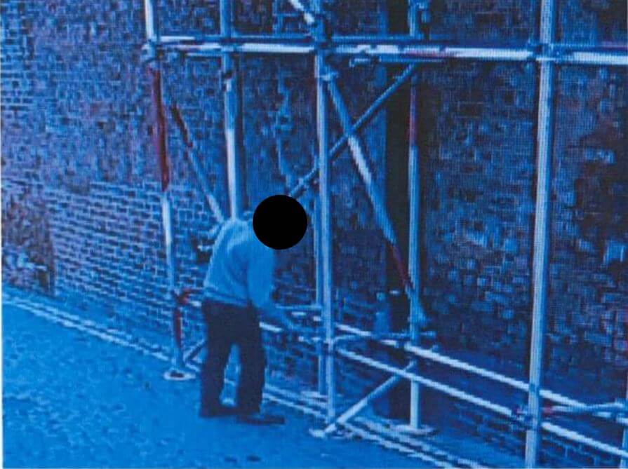 CCTV of man by scaffolding