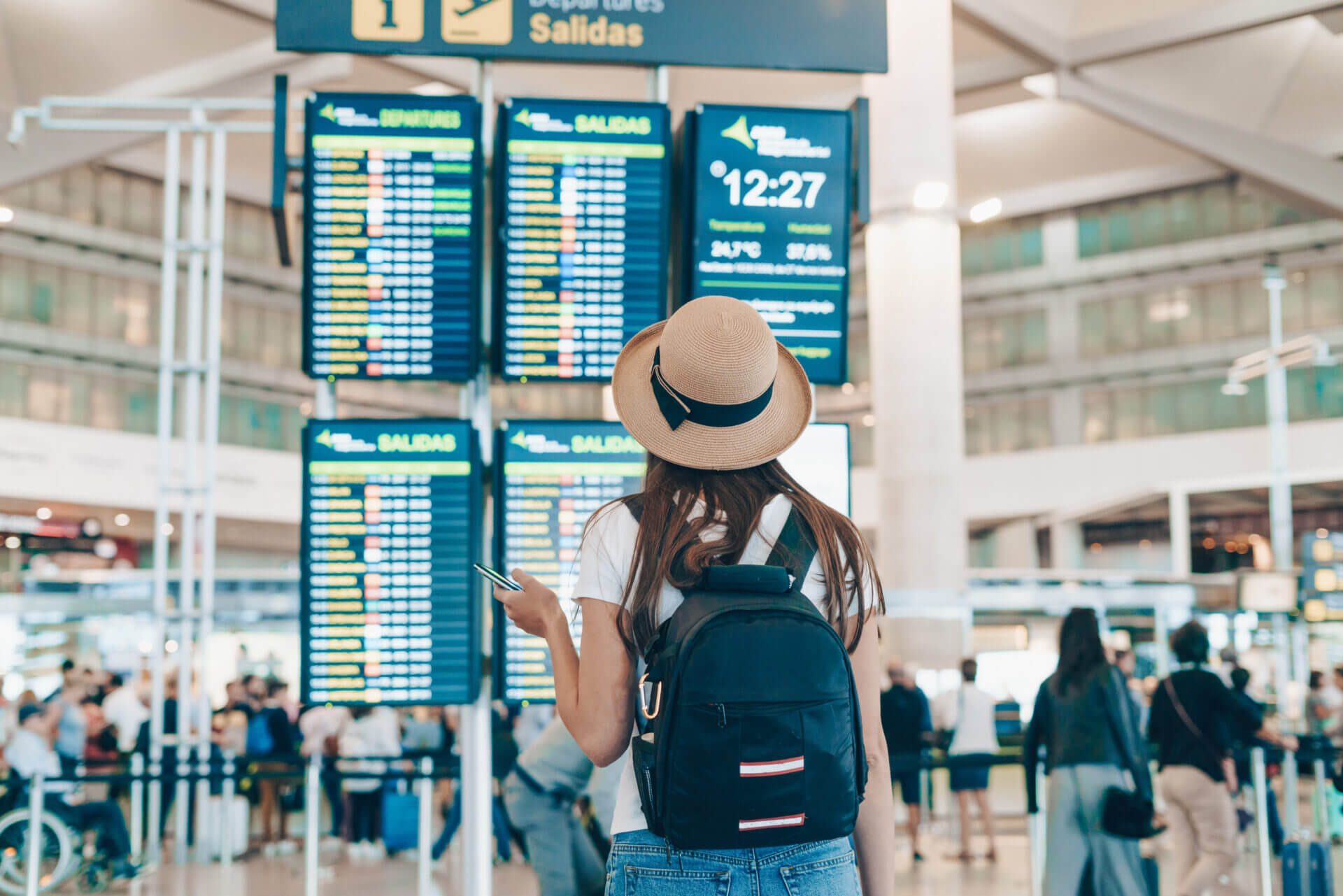 Image of Person Looking at Announcement Board