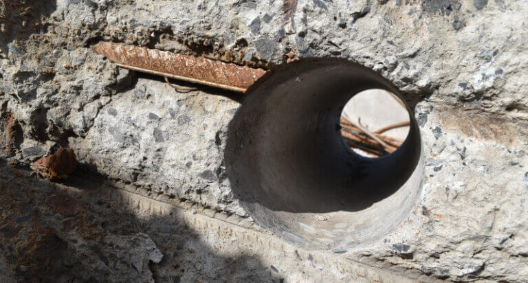 Photo of a concrete core hole and reinforcing bar