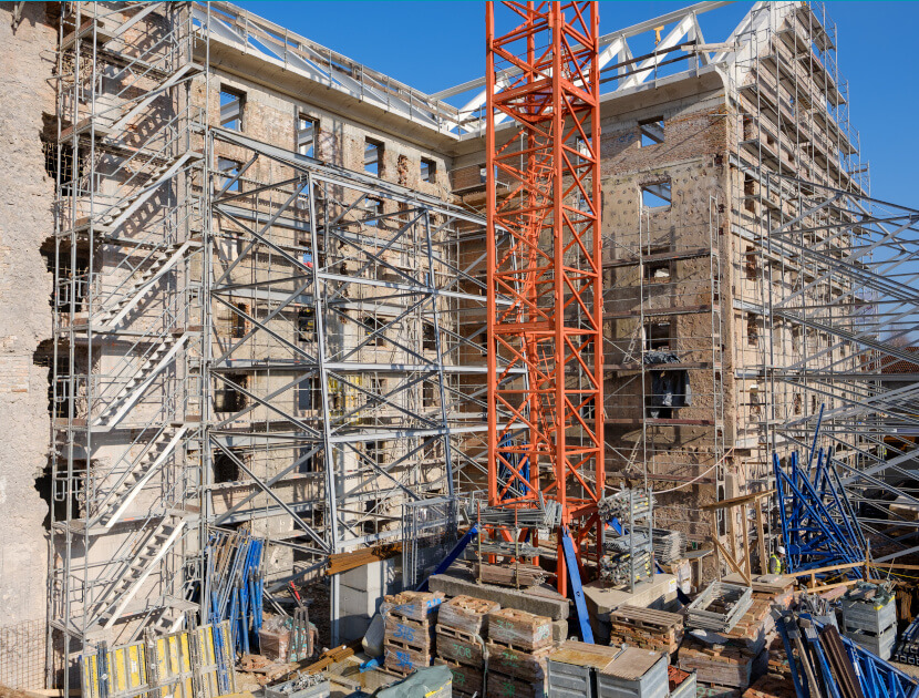 Building under construction with scaffolding
