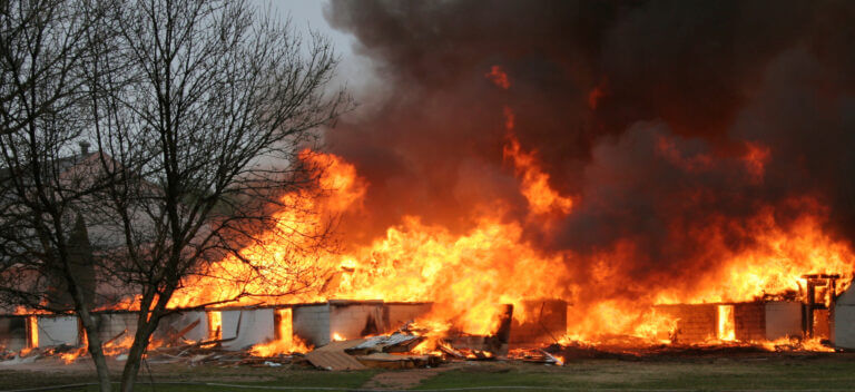 A large fire with multiple buildings in flames
