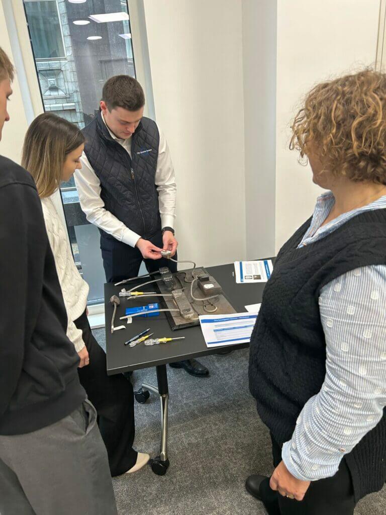 Helen Rosser demonstrating an electrical fire investigation